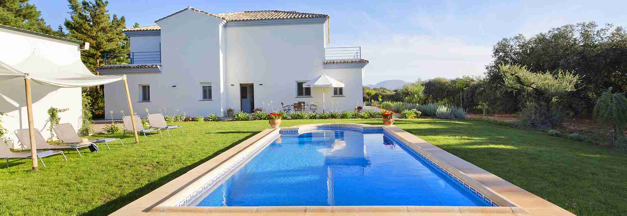 Gleaming Ronda villa with large private pool and green lawned gardens